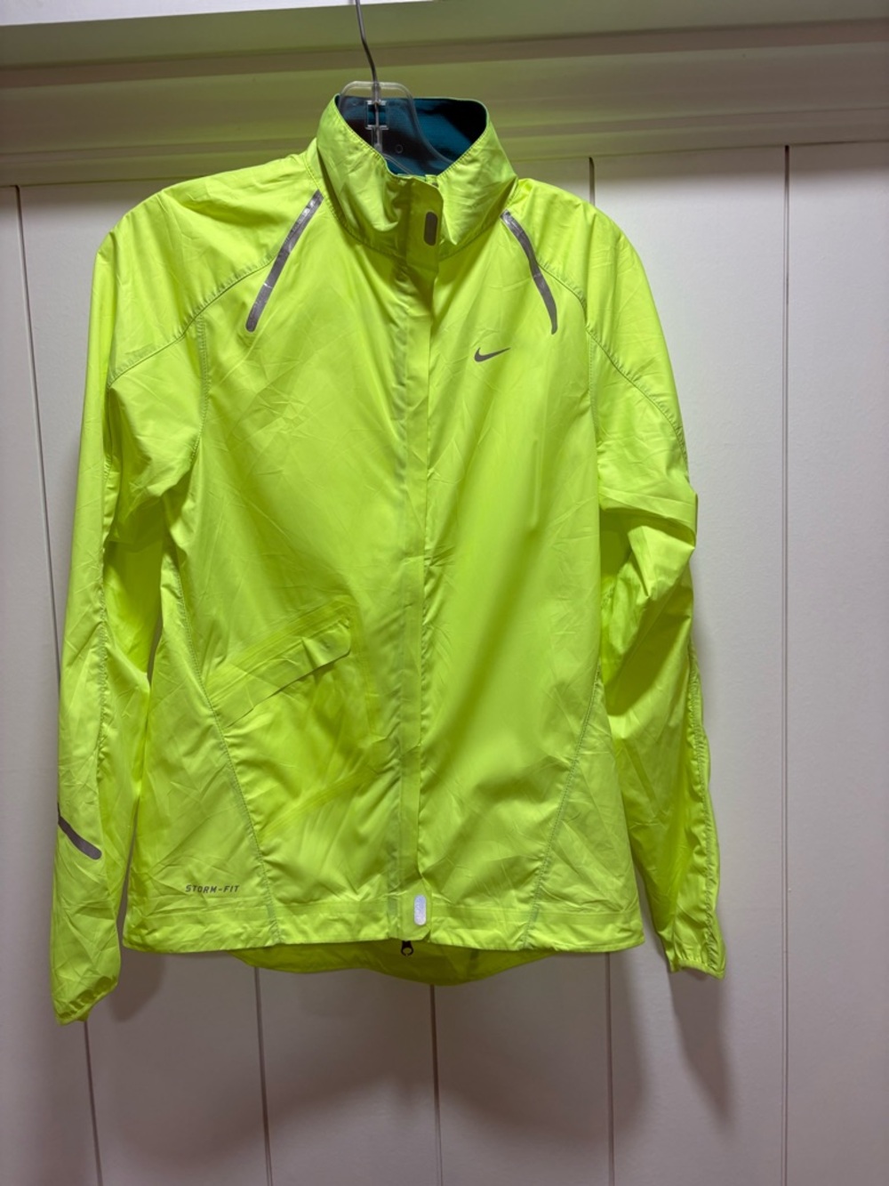 NIKE Women's StormFit Lightweight Reflective Rain Jacket Zest Yellow size XS